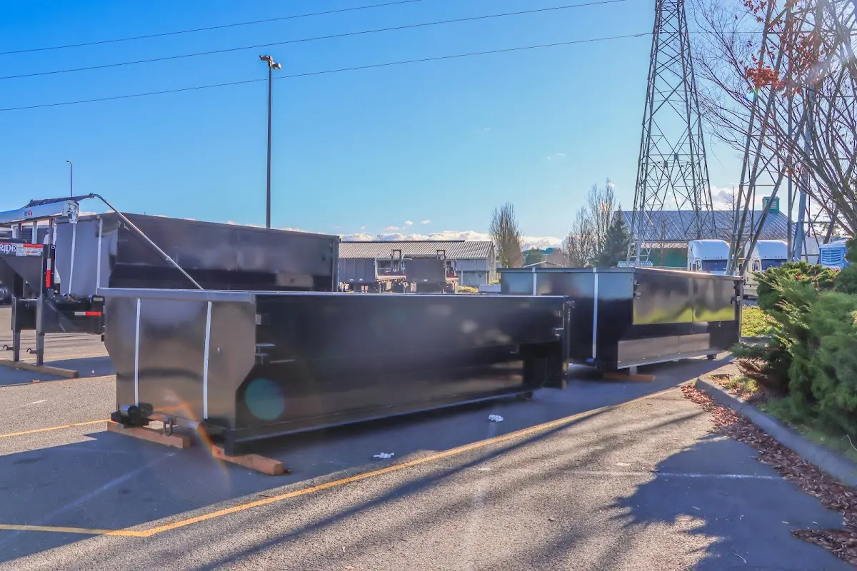 Roll-off dumpster ready for waste disposal at job site for 15 Yard Dumpster Rental in Taylors